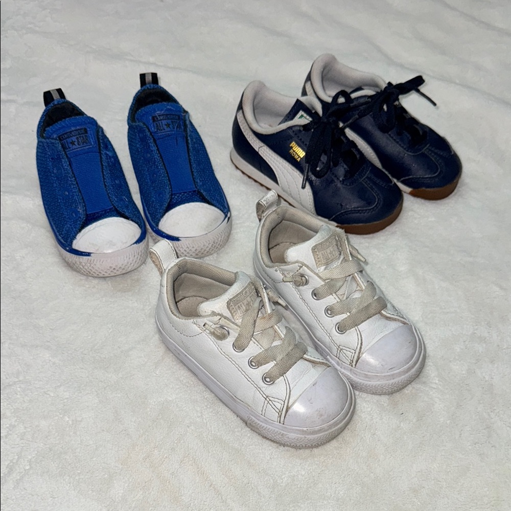 2 pairs of size 7 Converse Kids Sneakers in Blue and White and a pair of Pumas